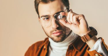 Man examines diamond